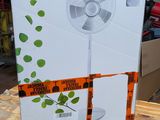 a box that is sitting on a table with a fan