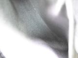 a close up picture of a white flower in a vase