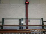 an image of a red stop light in a warehouse