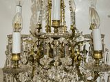 a chandelier that is hanging from the ceiling