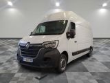 the white van is parked on a checkered floor in a room
