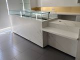 a counter with a glass top in a kitchen