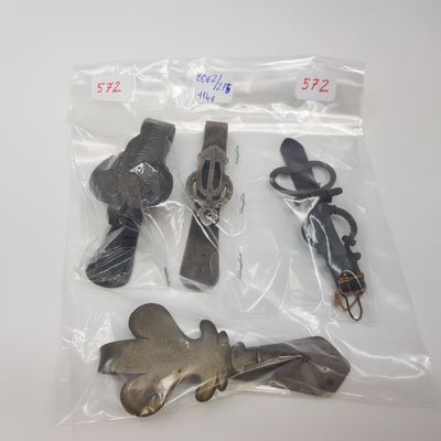 a bag of assorted items on a white surface