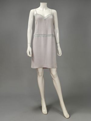 a white mannequine dress on display on a mannequin mannequin mannequin mann