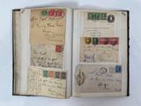 a book with a lot of stamps inside of it