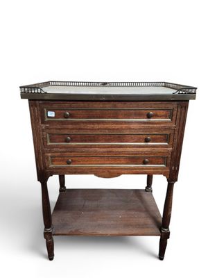 an image of a wooden table with drawers and a shelf