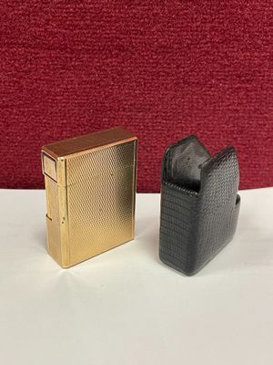 two lighters sitting next to each other on a table
