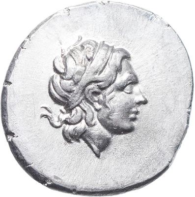 a close up of a coin with a woman ' s head on it