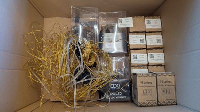 a cardboard box with a bunch of items inside of it