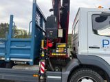 a large truck with a crane on the back of it