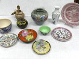 a table with a lot of different plates and bowls on it