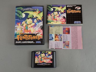 an image of a nintendo game with a box of games on the table