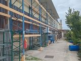 an image of a building with scaffolding on the side of it