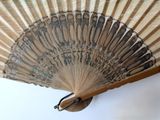 a fan that has a design on it