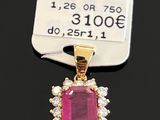 a close up of a pink stone and diamond pendant on a black surface