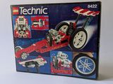 a box of lego technics on a white surface