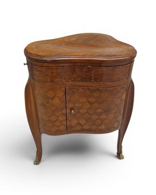 an image of a small wooden chest with a drawer on top of it