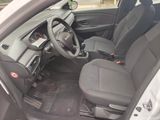 the interior of a car with a steering wheel and a dash board