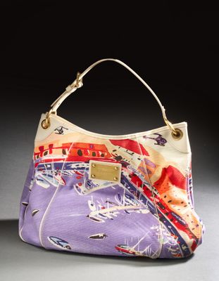a purple purse with a picture of a train on it