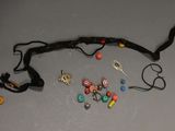 a bunch of jewelry that is laying out on the table