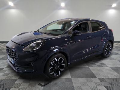 the new ford kadgo is parked in a showroom