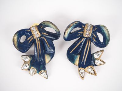 pair of blue and gold bow brooches with crystal stones