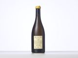 a bottle of wine sitting on top of a table