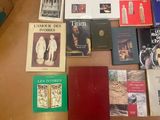 many books that are on the table together