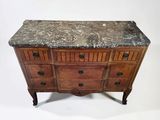 a marble top chest of drawers on a white background