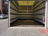 a truck that is parked in front of a building