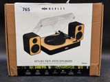 an image of a box with a record player and speakers