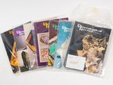four books in the bag on the table
