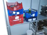 many containers and containers on the shelves in the kitchen