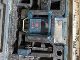 a tool in the case and a ruler on the floor