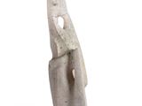 sculpture of a hand holding a knife on a white surface