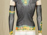 a mannequin with a tattoo on the back of it