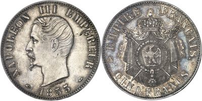 a close up of a coin with a crown on top of it