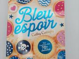 the cover of a book with a picture of cookies and a skull on it