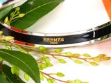 a close up of a bracelet with a name on it