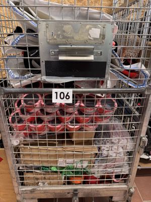 a shopping cart with a lot of items inside of it