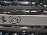a picture of a conveyor belt with a sign on it