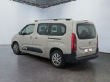 citroen van parked in a showroom with white walls and grey flooring