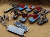a lot of different types of toy trains on the ground