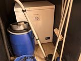 a blue bucket with a vacuum and a blue bucket with a mop on it