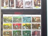 a picture of a picture of a collection of stamps on a refrigerator