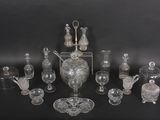 a lot of glass items that are on a table