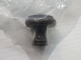 a plastic bag with a small black object in it