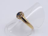 an image of a close up of a ring on a clear surface