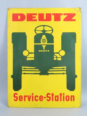 a yellow and green sign advertising a service station