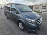 the mercedes v - class van is parked in a parking lot